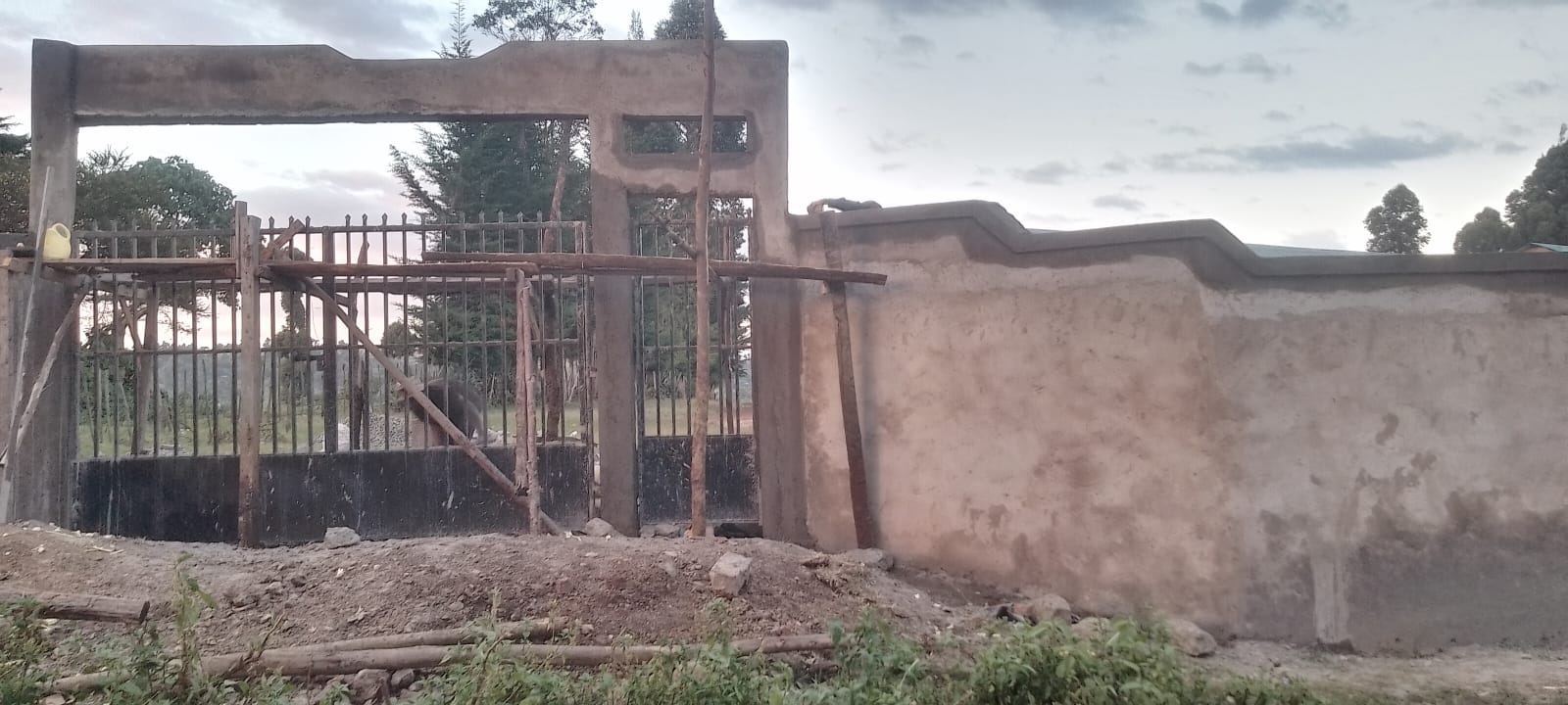 Perimeter wall and gate progress